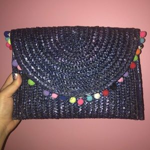 Blue Straw Clutch with multi-color Pom Poms